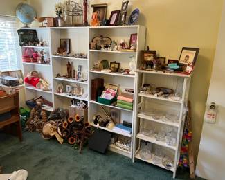 There are bookcases as well, even if they hold furnishings other than books!  Come take a look to see what is here.  Can you find the birdcage?  What about the sunflowers?