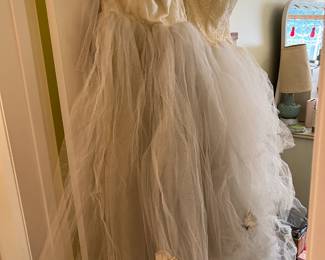 These evening gowns are vintage from the 1950s.  