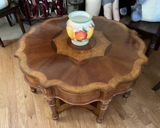 This low table is beautifully designed and built.  And the vase is quite pretty as well.