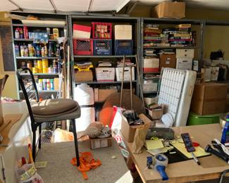 The garage has quite the collection of paints, wood stains, and other cans.  There are a few more board games and a B-24 Liberator model by Revell (again, it could be just the box).  Lots of items to look through.