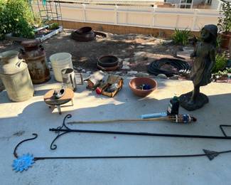 There are also a few garden hangers, plus a vintage milk can and various pots and statuary.