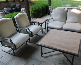 * Patio furniture. The set includes two chairs, 1 sofa, 2 tables, made by O W Lee. The sofa is 82 x 33, The chairs are 33 x 30 and rock a little. The large table is 42 x 42 and the small table is 24 x 24.