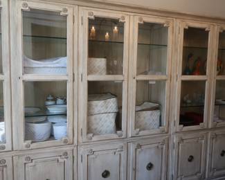* china cabinet- it has three sections Size is 79" tall, 18" deep, 120" wide.