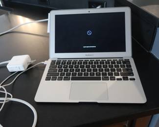 Apple Mac Book Air computer-working