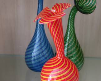 Three signed glass vases.