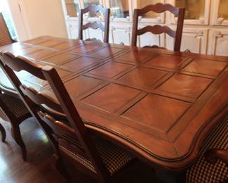 * Century dining room table with 6 chairs. It has 6 chairs, two leaves ( 22" each ) and pads. The table is 72" x 43" w/o leaves.