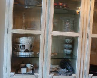 China storage cabinets. There are three pieces in the unit with a top that connects them.