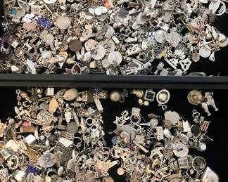 Hundreds of sterling silver charms...there are lots of charm bracelets not pictured too!