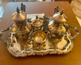 Silver set and misc. serving utensils (not pictured).