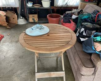 30-inch wood table with 4 cm hole for optional umbrella. Original box is available. 
