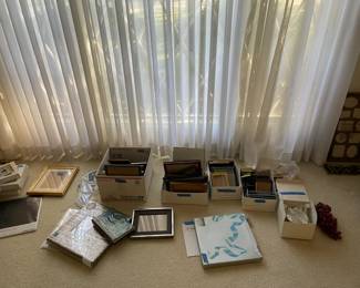 Various picture frames and photo albums; some never used.