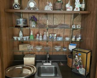 Various Collectibles:  Incl. a Soki set & Japanese Geisha Girl in display case, purchased in Japan. Silver tray, dinner bells, Lenox, crystal clock, etc.