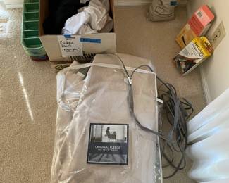 Fleece king blanket and Cuddle Dud's to keep you warm. An additional navy blue blanket avail and various medical aids. 