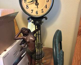 crosa clock maiden w/ pendulum 