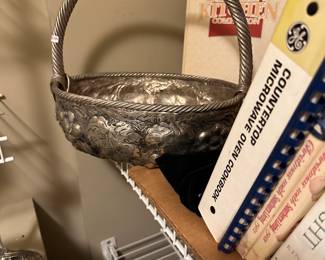 Silver embossed basket, vintage cookbooks