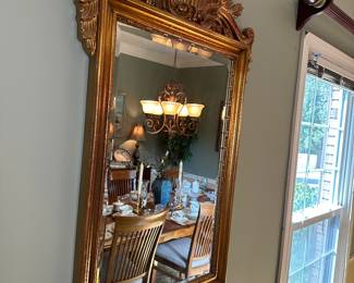 Gold leaf mirror with shell motif freeze