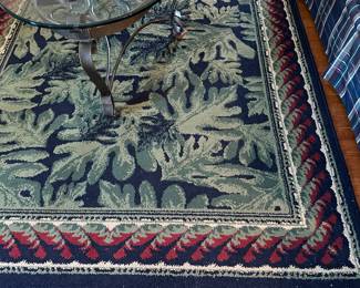 Navy blue, green, red wool area rug