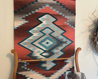 American Indian hand woven carpet, Blackfoot maiden sculpture under glass, American Indian dancer with eagles mask 