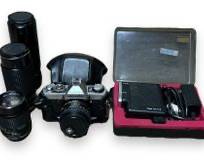Minolta XG1 35mm Film Camera w/ MD Rokkor 50mm f/1.4 Lens, A Canon Zoom Lens FD 100-200mm f/5.6, And More!