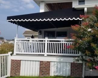 Vinyl railing; awning - approx. 14 ft. sq.