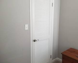 Louvered interior door