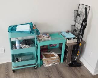 Carts and small tables; storage aids; vacuum cleaner