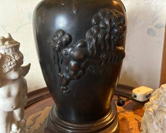 Pair of metal lamps. One is damaged