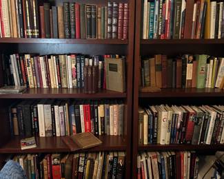 Pair of bookshelves and books