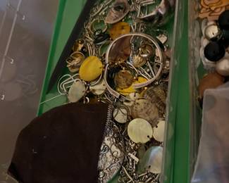 Bins and bins full of all types of costume jewelry. Some vintage and very rare