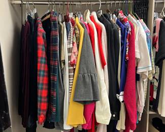 Four closets full of wonderful condition many new with tags, colorful clothing
