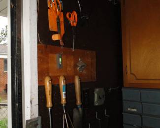 Hand tools for the yard, and sissors too.