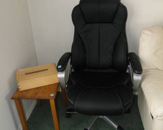 Office chair, tissue box, and small solid wood end table