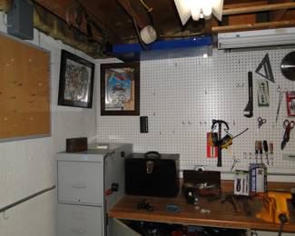 Fun mirror picture, and lots more tools too, along with cork board for important information, or coupons