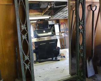 Large framed black mirror, very classic, and super chic