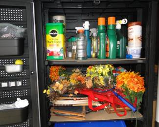 Plenty of yard and garden supplies, and if you cannot grow flowers, we got you covered as well on shelf number two