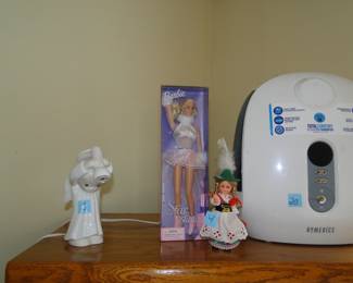 Angel shine down Precious Moments, along with a Barbie in the original case, and a room humidifier
