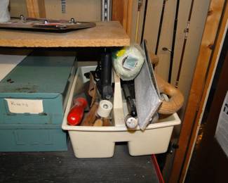 Wallpaper and wood working supplies, along with boxes of rivets