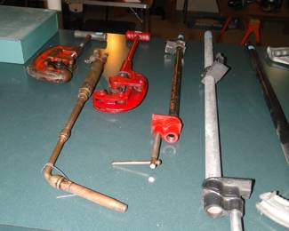 Clamps and pipe cutters