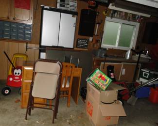 Very nice desk that matches the interior furniture, and some more folding chairs too