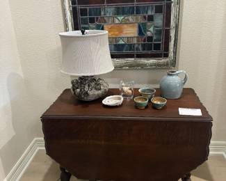 Antique oak gate leg table and stained glass window