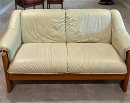 Teak Accented Leather Sofa / Couch by Ekornes 

Made in Norway 

Measures 60 x 35 x 30 inches. 
