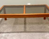 Gorgeous Glass Top Teak Coffee Table by Johannes Anderson 

Made in Denmark 

Measures 43 x 27 x 16 inches. 