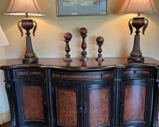 entry buffet with candlesticks and lamps
