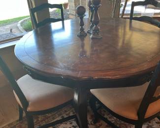 round table with four chairs