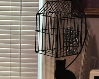 Patient kitties bird cage