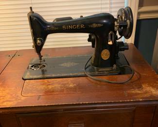 1940s original Singer fold down Sewing machine with table.