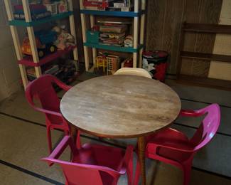 Wood Round Table and Plastic Outdoor Chairs 