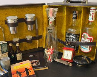 Traveling Bar, vintage bottles, stir sticks, ashtrays 