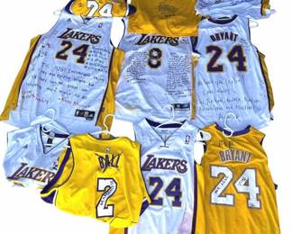 Lot # : 614 - Kobe Bryant Staples Center fan tribute jerseys
