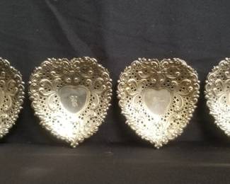 Lot # : 94 - Group of heart-shaped sterling silver repousse
